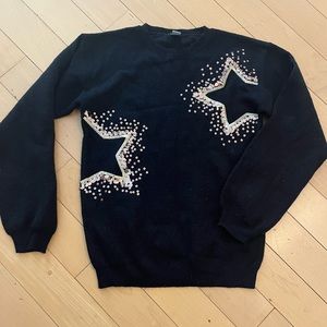 Kids black sweater with sparkly star design